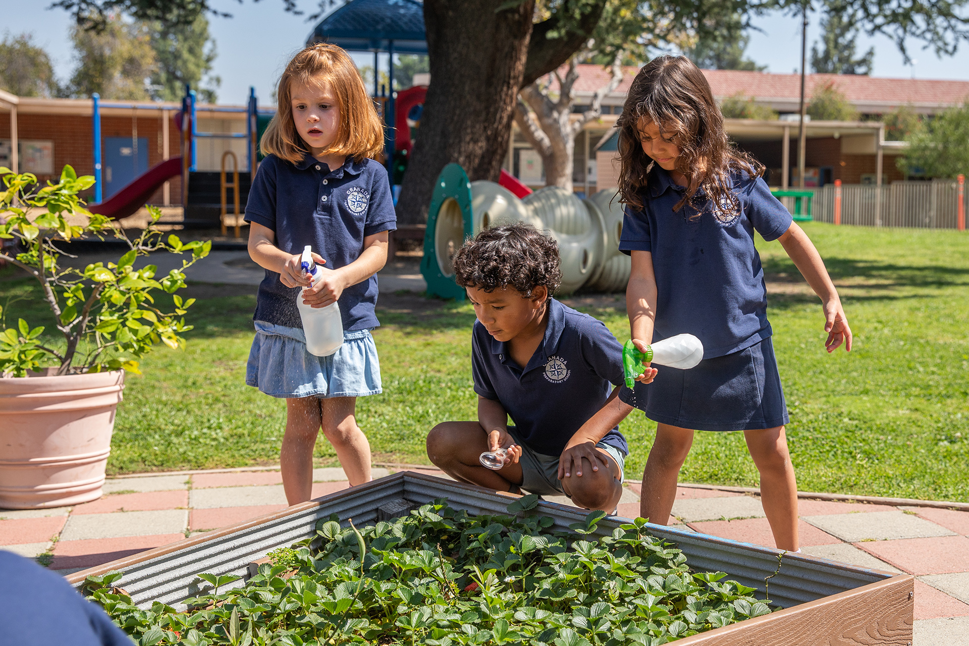 GPS students hands-on learning in the garden